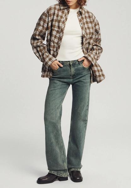 Интеллигентный клеш: bootcut — идеальные джинсы для фигуры plus size